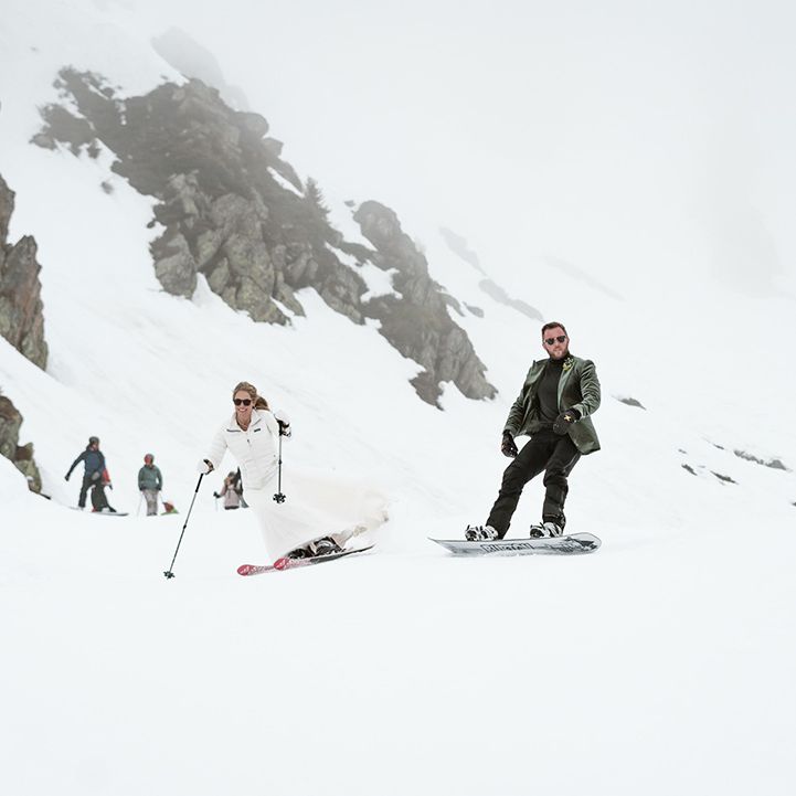 bride-and-groom-skiing-together
