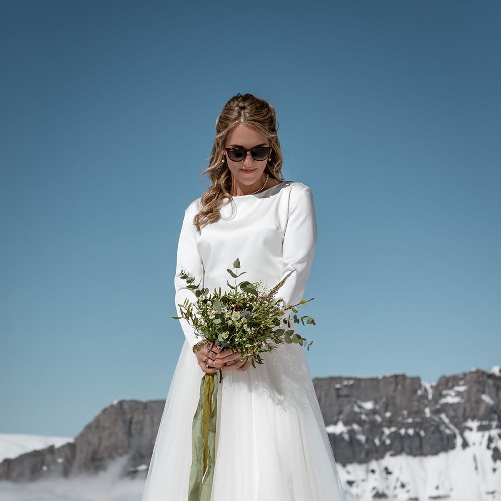 bride-wearing-sunglasses-in-two-piece-outfit
