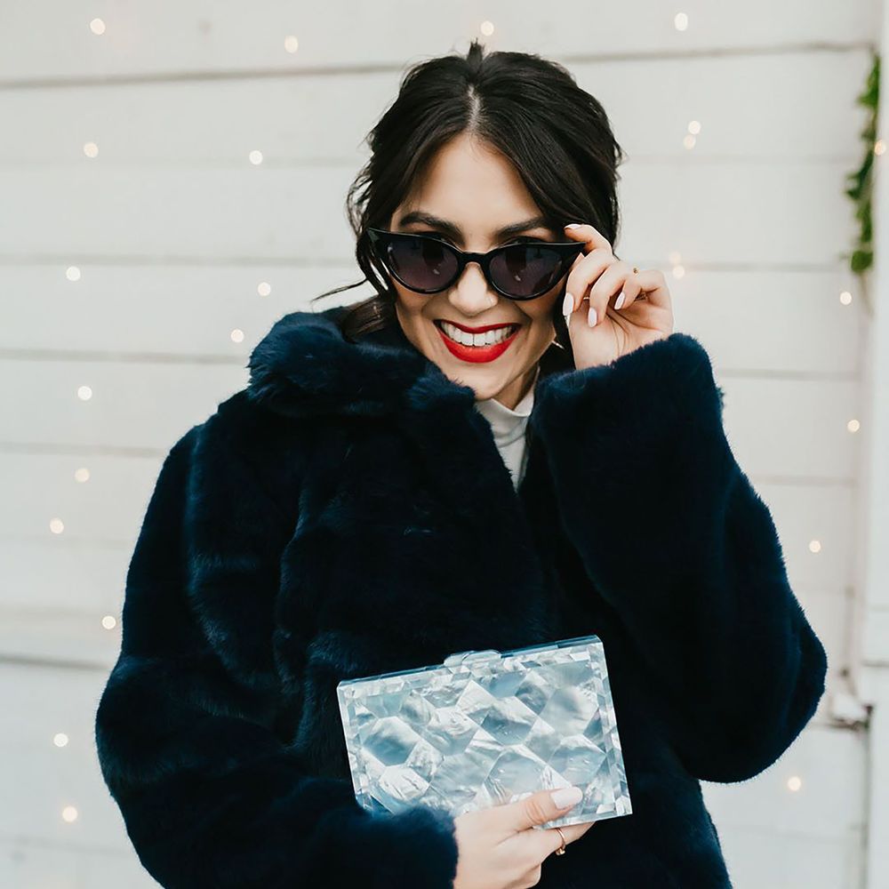 Navy faux fur jacket for winter wedding