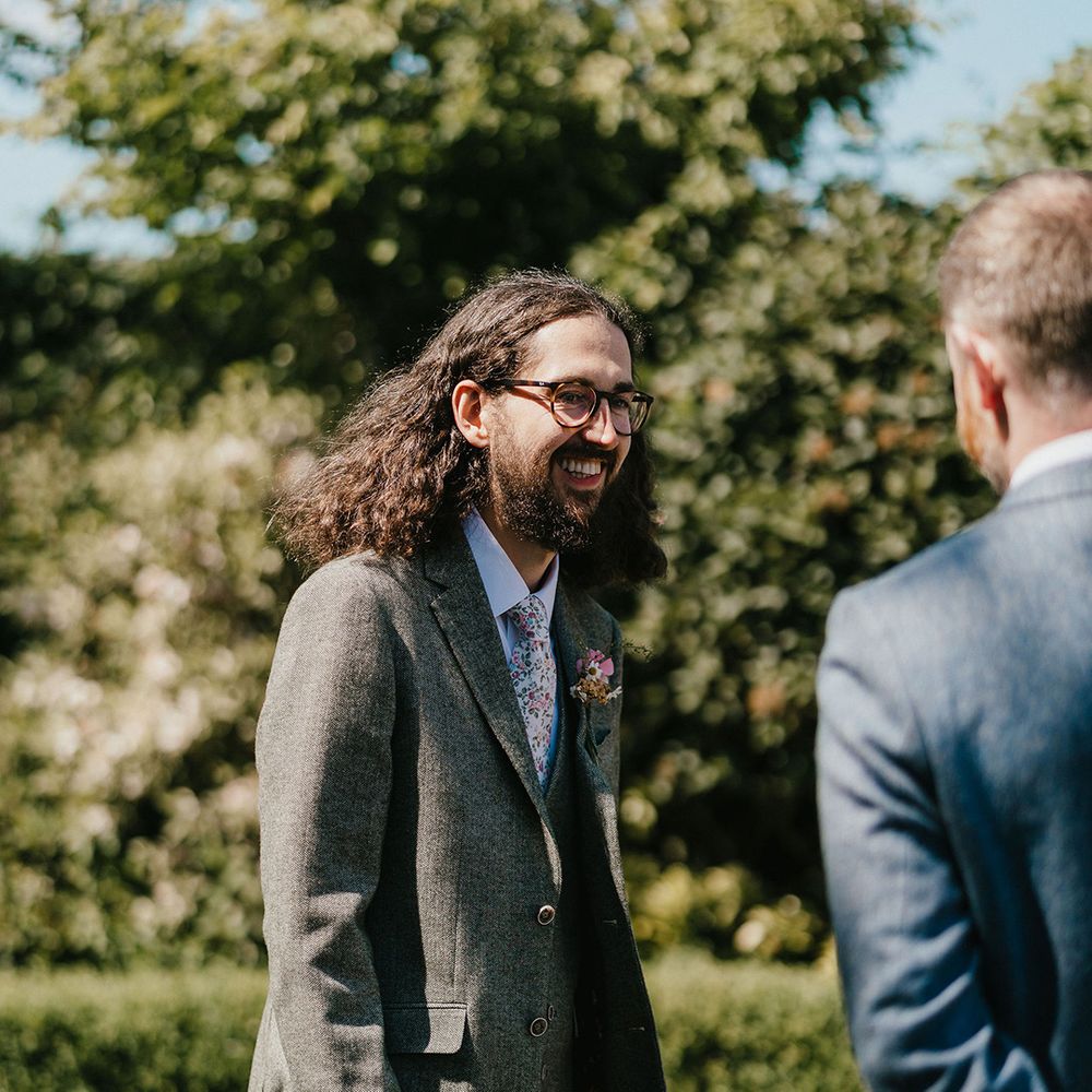 groom-in-green-wedding-suit