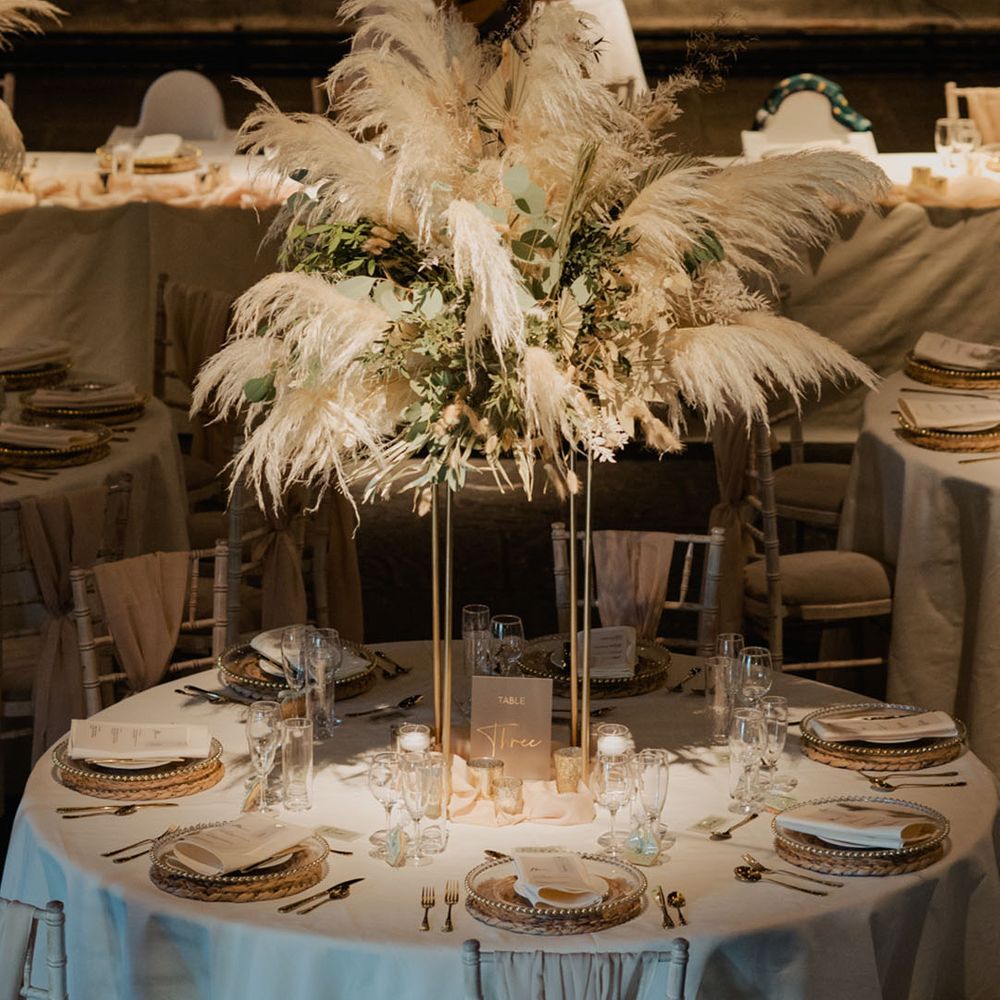 Big white pampas grass table centrepiece for winter wedding