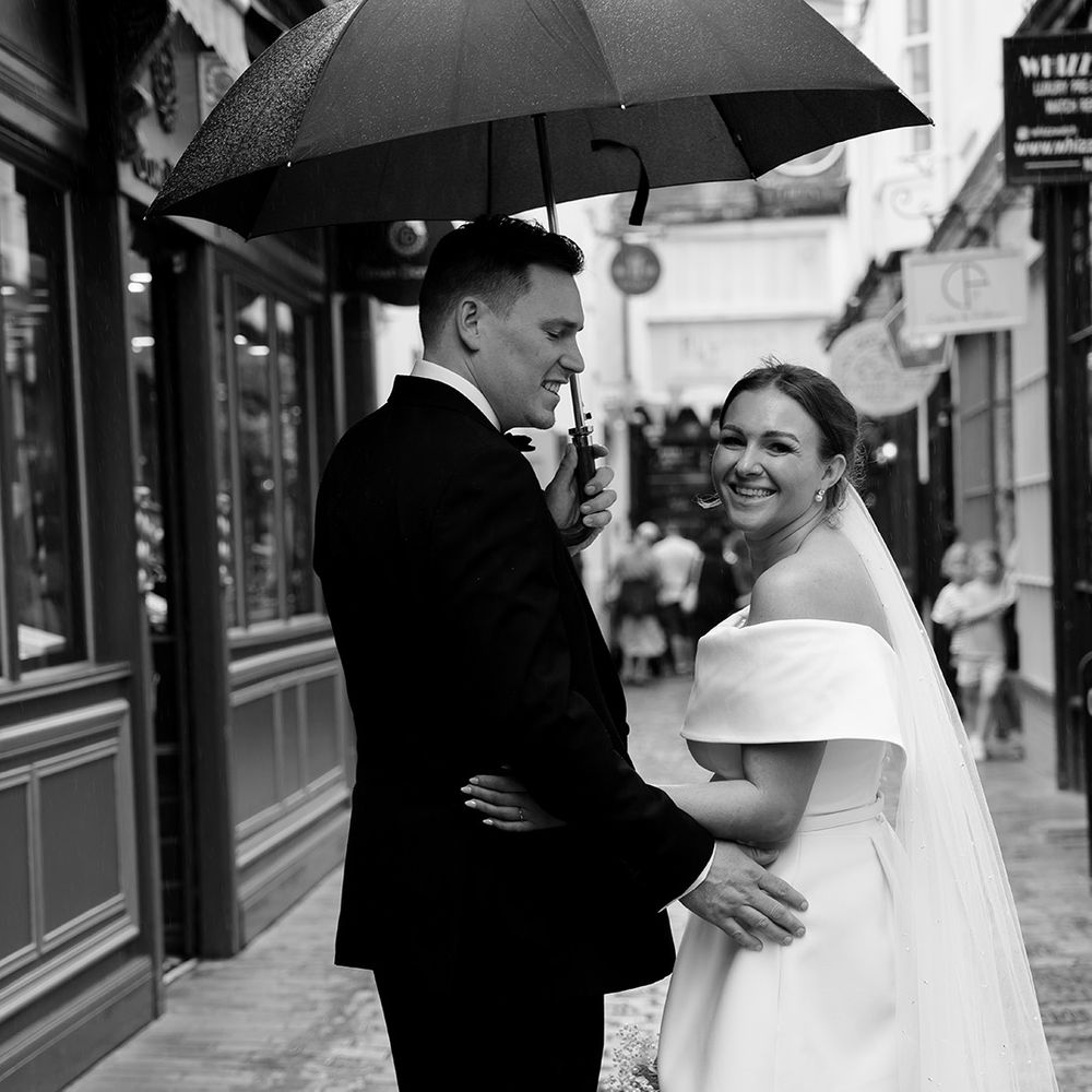 black-and-white-couple-portrait-under-umbrella