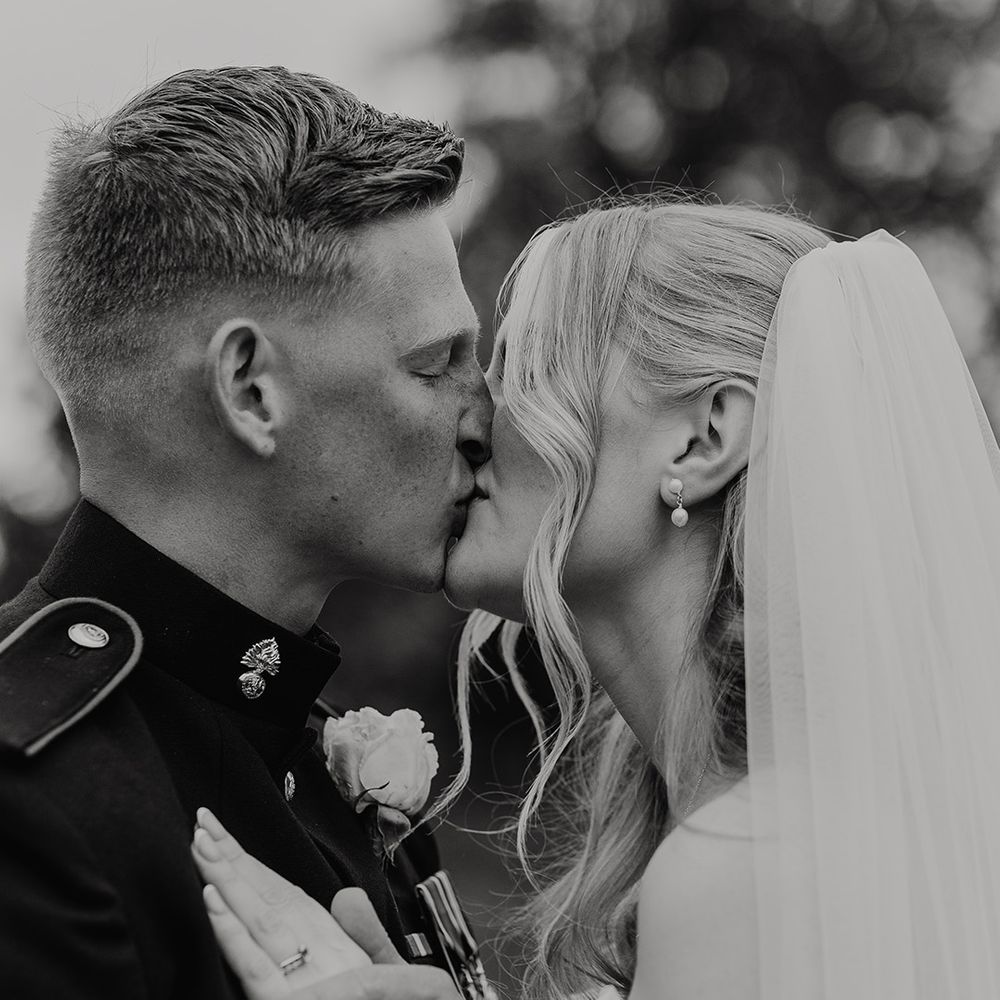 black-and-white-couple-portrait-kiss.