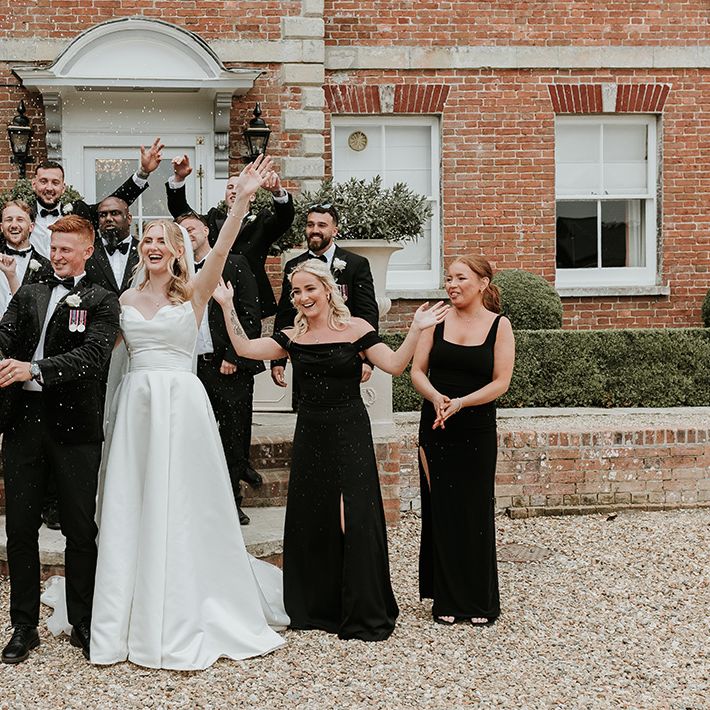 champagne-pop-wedding-party-group-photo