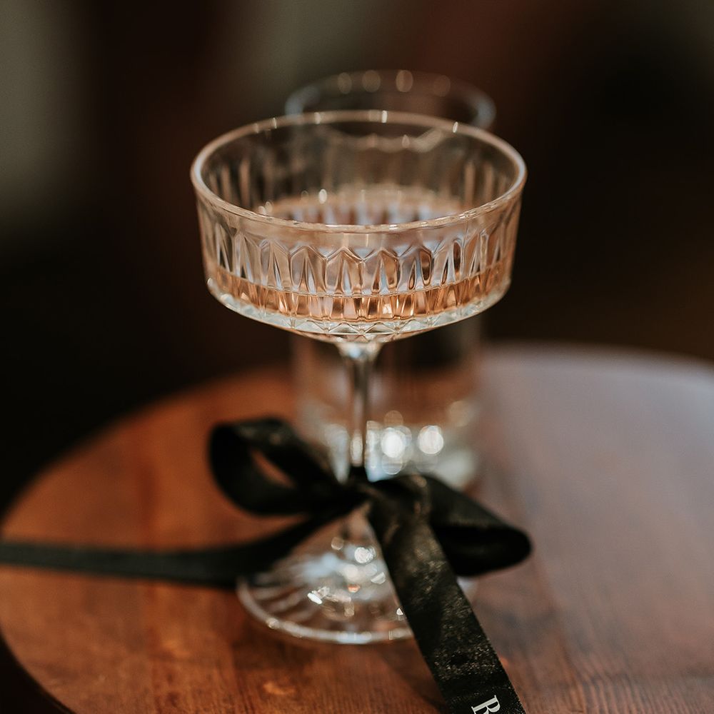 coupe-glass-with-black-bride-bow