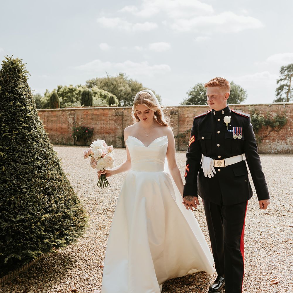groom-in-military-uniform-with-bride-in-strapless-wedding-dress