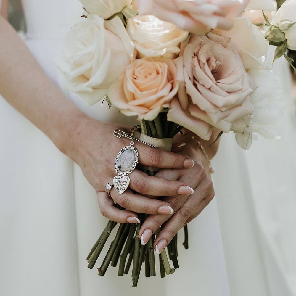 pink-rose-wedding-bouquet-with-charm-to-honour-deceased-loved-one