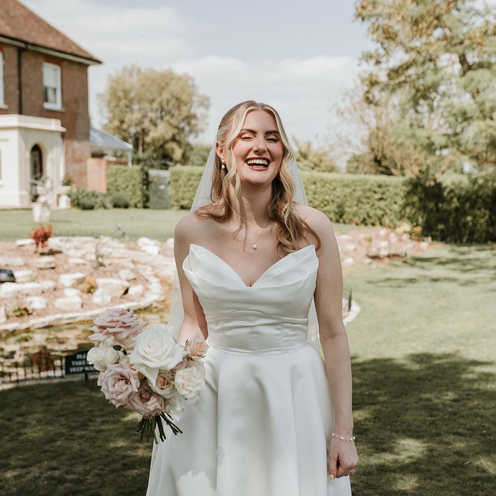 smiling-bride-in-strapless-wedding-dress