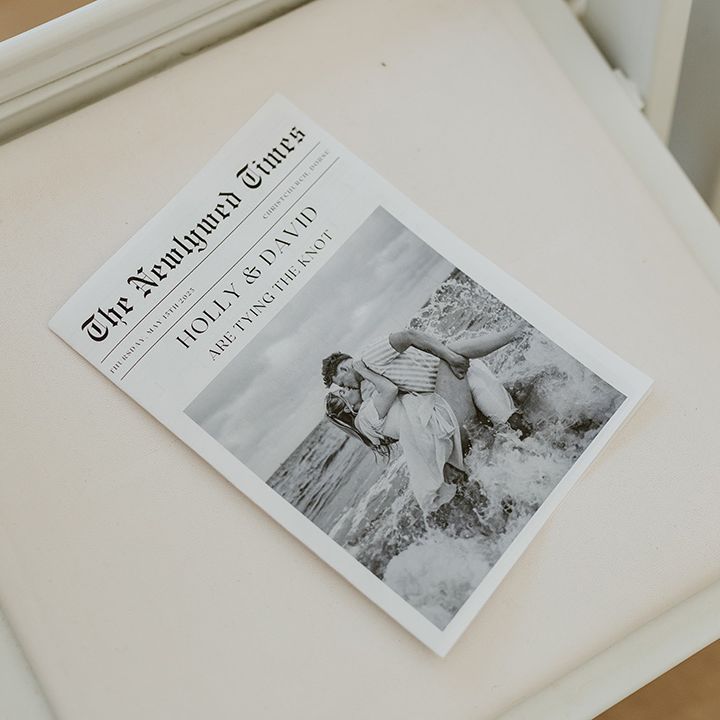 wedding-newspaper-on-chairs-for-ceremony