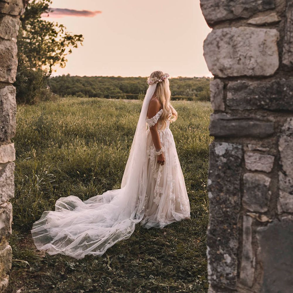 bride-in-boho-floral-wedding-dress-with-flower-crown