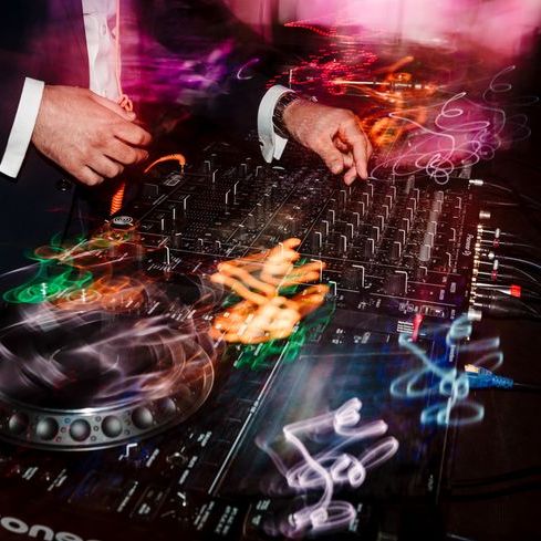 Wedding DJ Playing At Wedding Reception