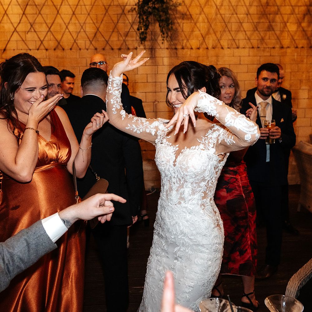 bride-dances-with-her-bridesmaid