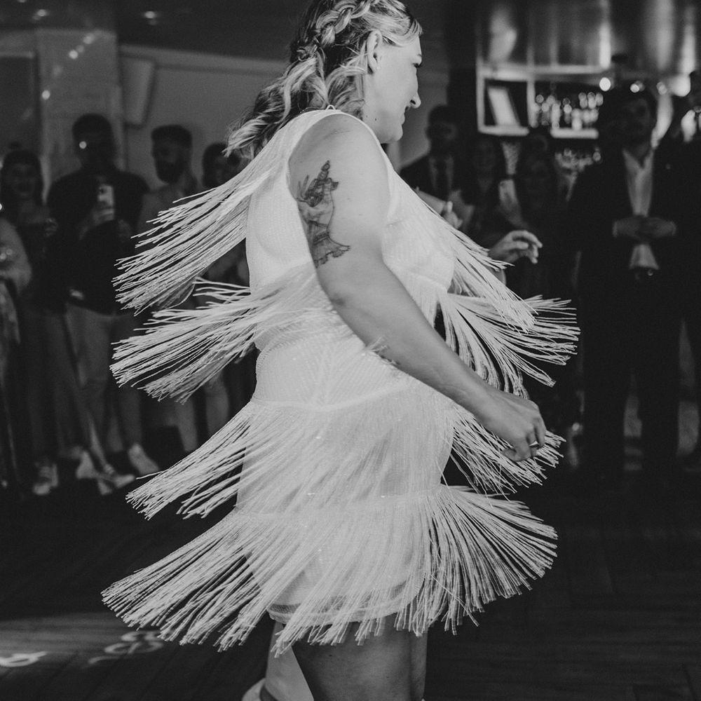 bride-in-short-tassel-wedding-reception-dress