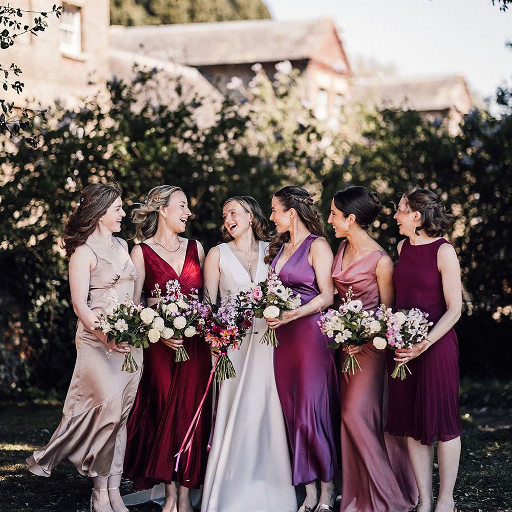 Mismatched burgundy and purple bridesmaid dresses