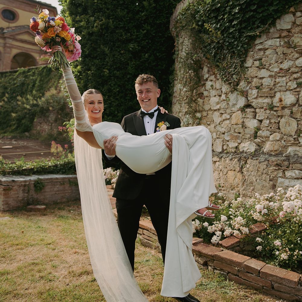 groom-lifts-bride-for-princess-carry