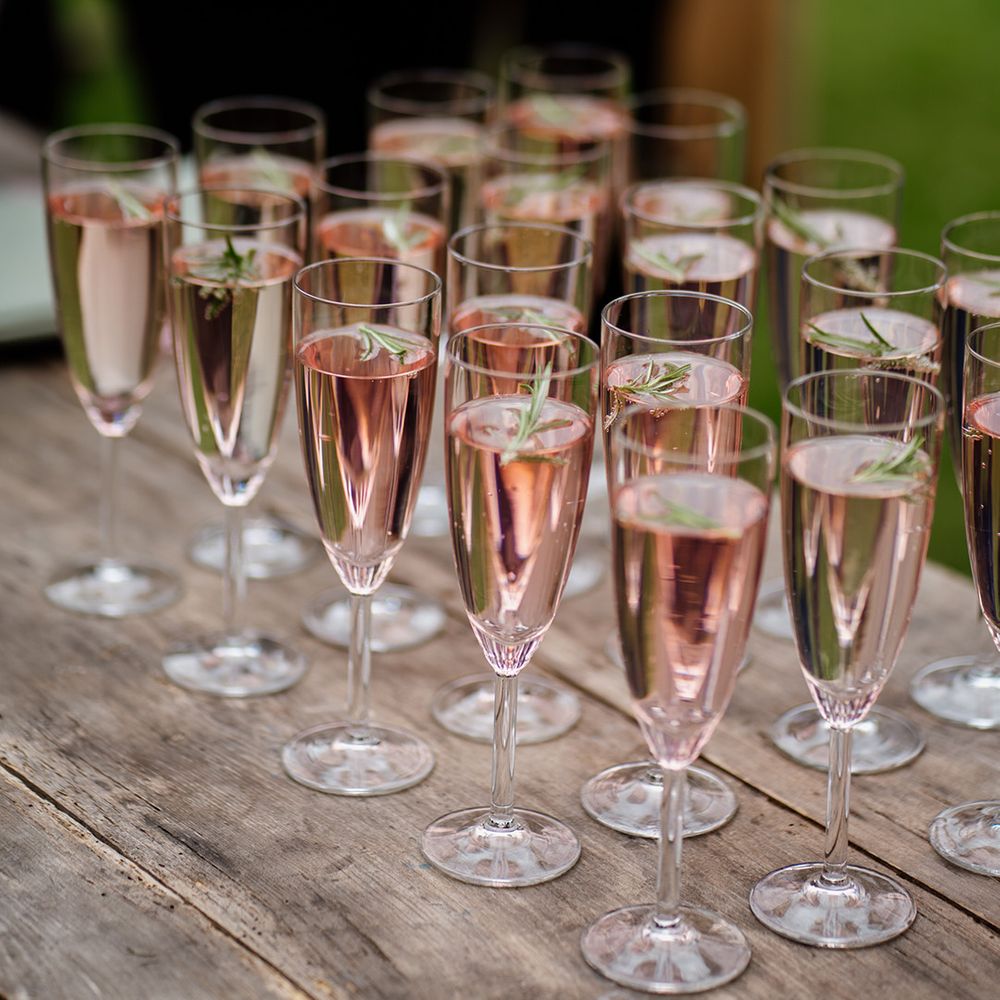 Pink prosecco in small flute glasses