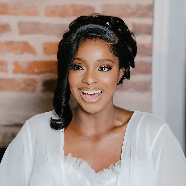 Bride With Glowing Wedding Makeup and Hair in Updo