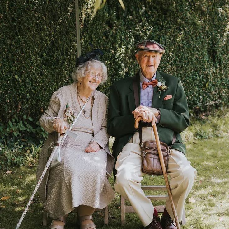Elderly Wedding Guests Attending Outdoor Rustic Wedding