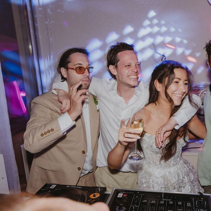 bride-and-groom-with-dj-at-ibiza-wedding-reception