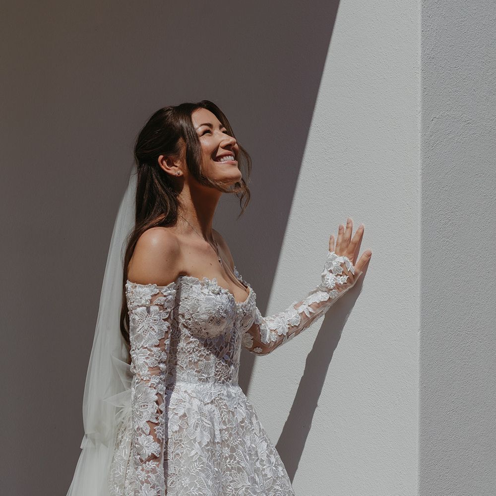 bride-in-long-sleeve-strapless-lace-wedding-club-wedding-dress