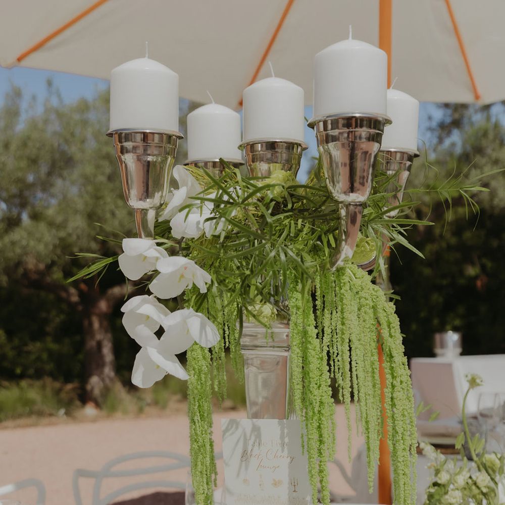 tall-candelabra-centrepiece-with-green-moss