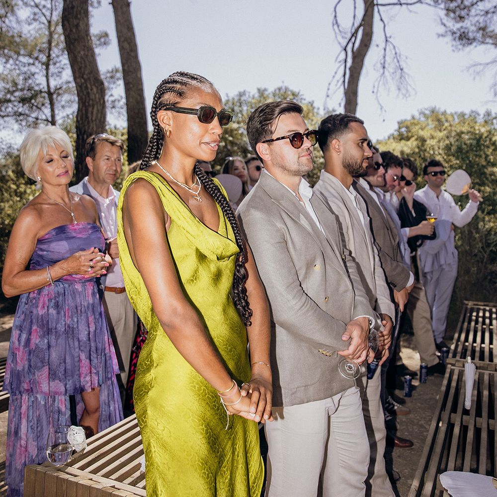 wedding-guests-standing-for-wedding-ceremony