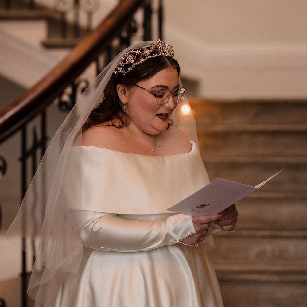 bride-in-off-the-shoulder-wedding-dress-with-tiara