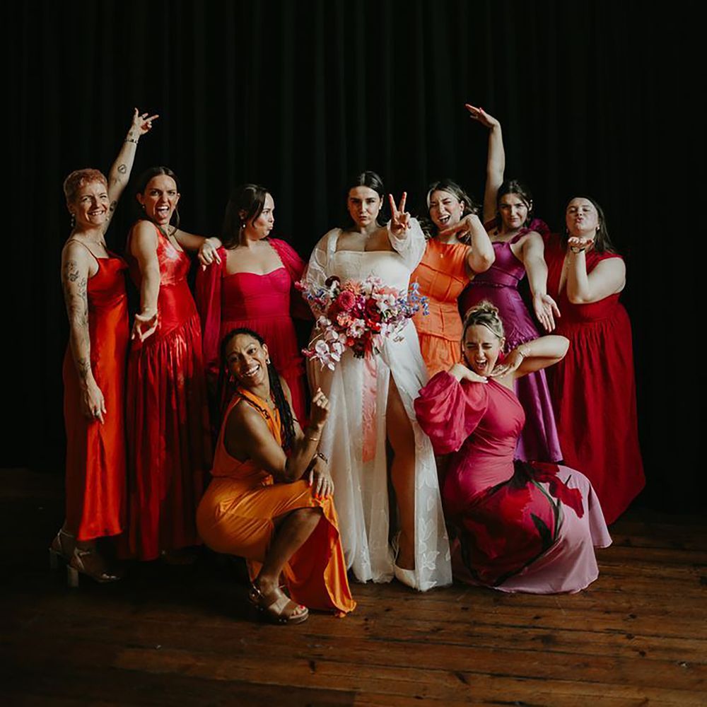 Mismatched pink, orange, red and purple bridesmaid dresses styled on different body types 