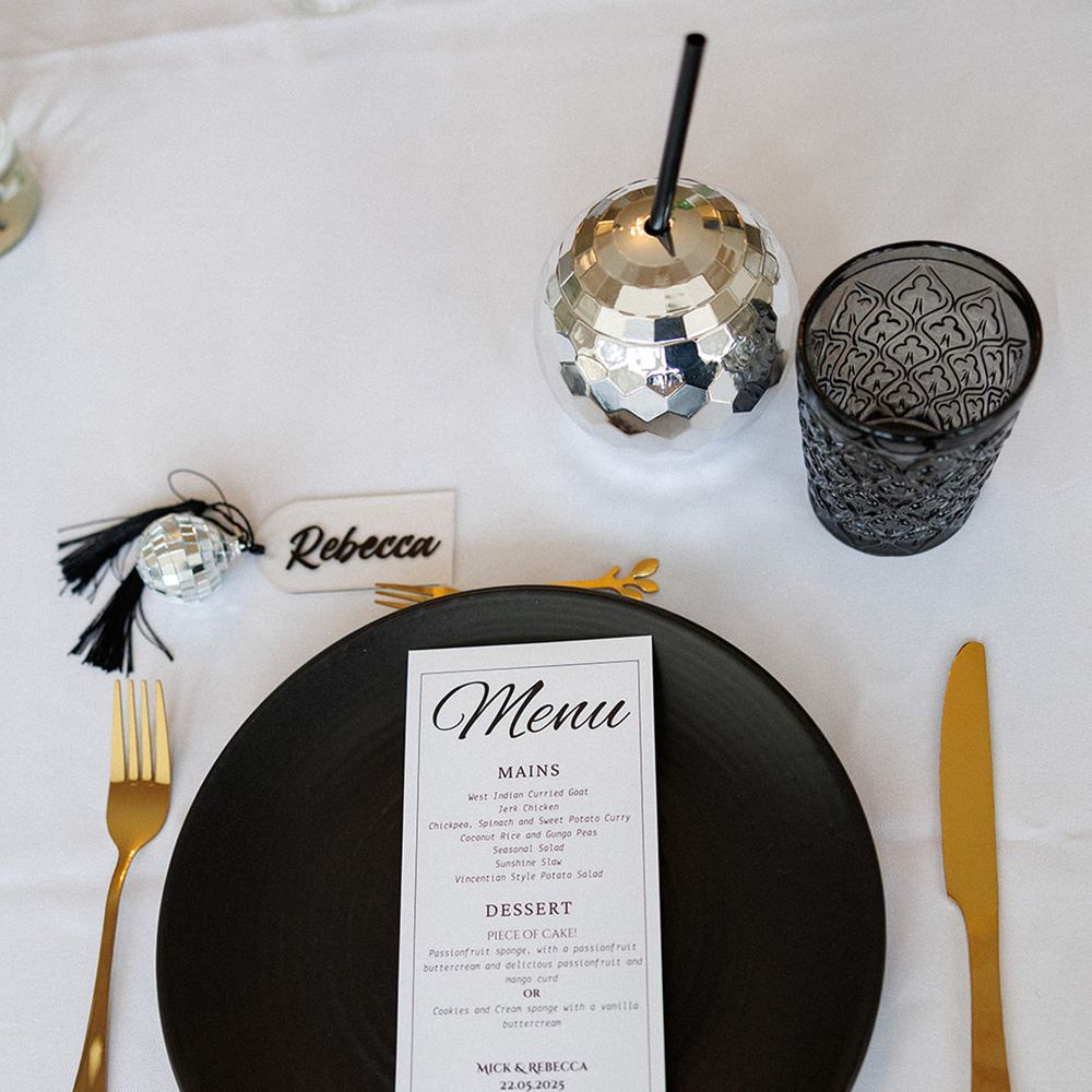 black-gold-disco-theme-wedding-place-setting