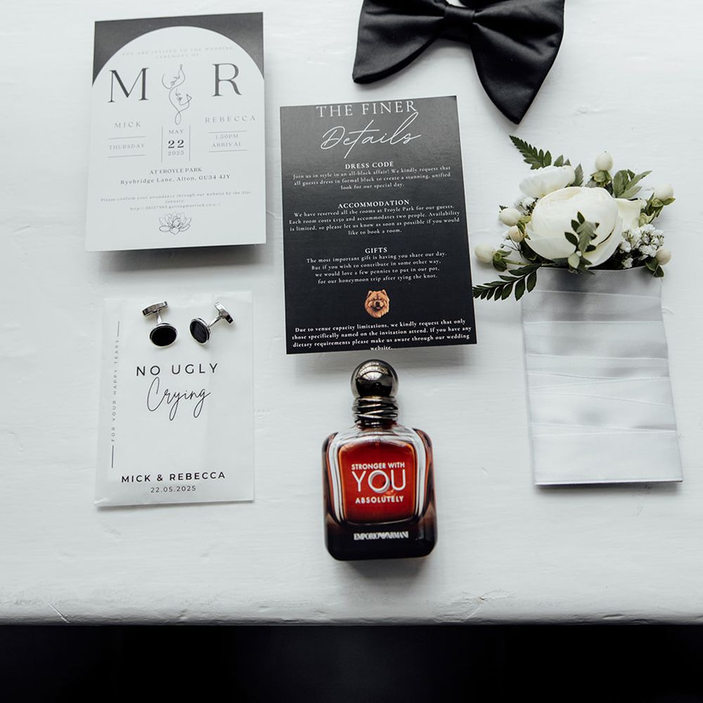 groom-accessories-and-black-and-white-wedding-stationery