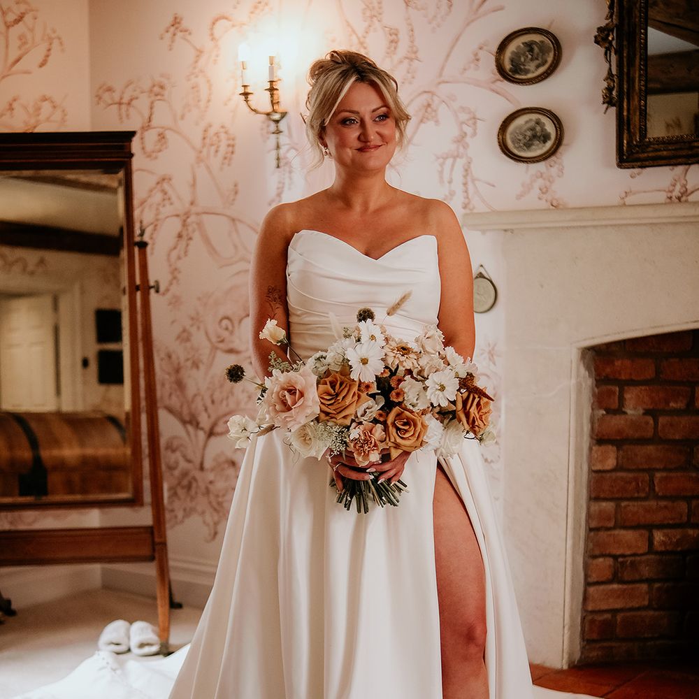 bride-in-strapless-wedding-dress-with-front-slit