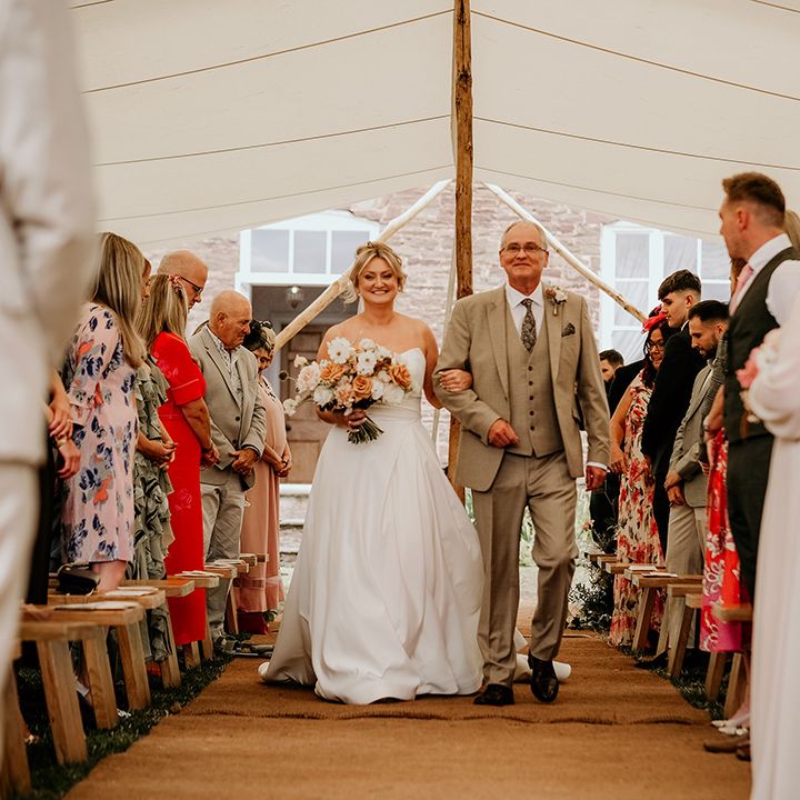 father-of-the-bride-walks-bride-down-the-aisle