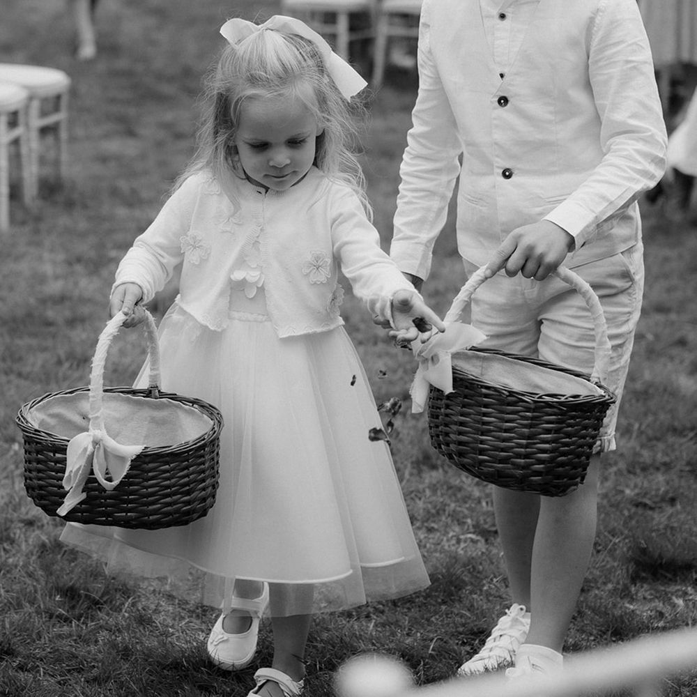 flower-girl-and-page-boy-walking-down-aisle