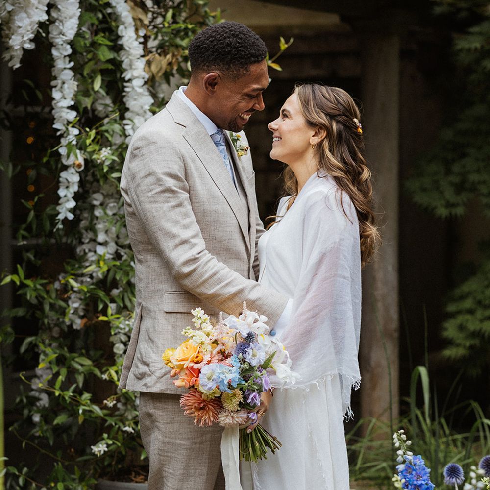 groom-gazes-into-brides-eyes