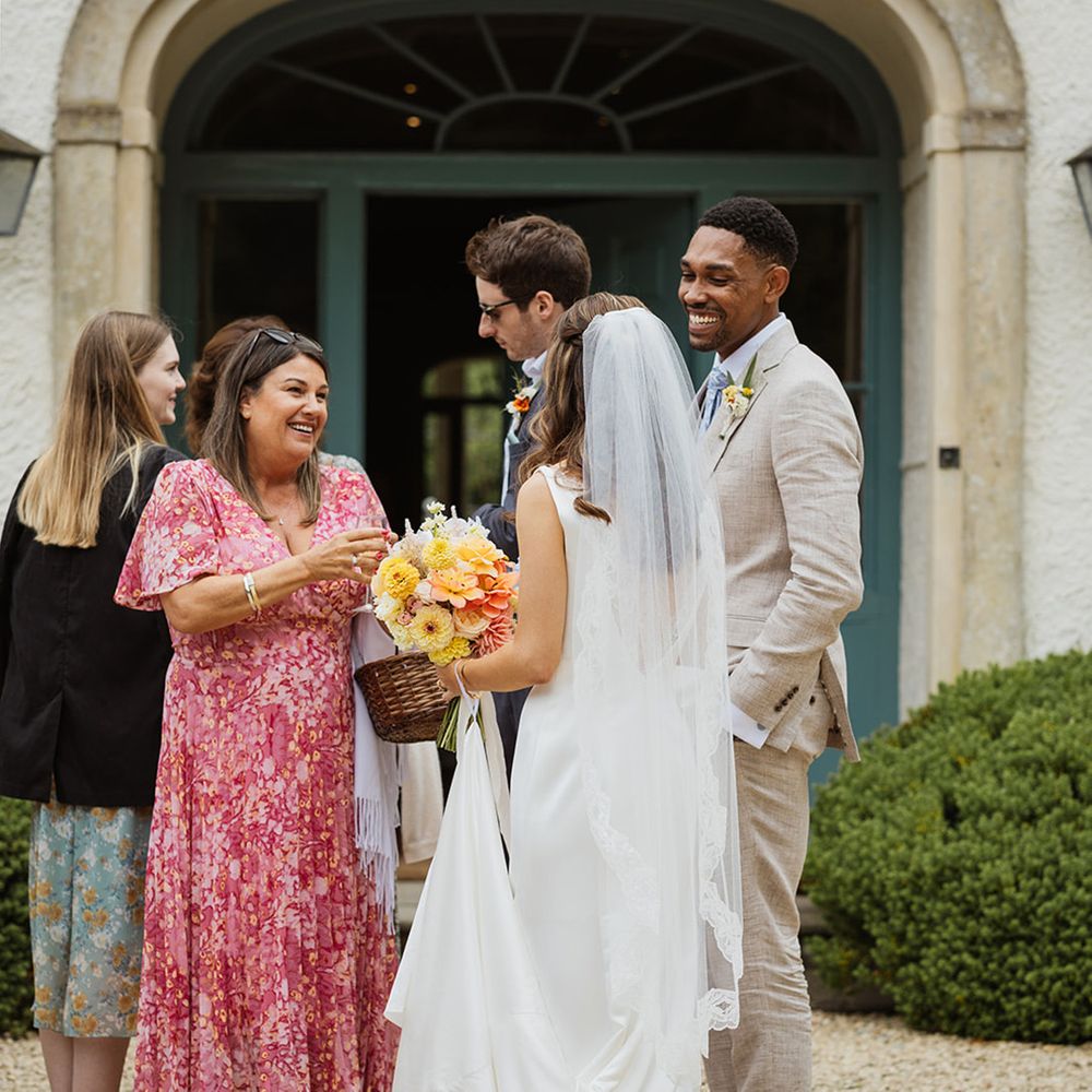 wedding-guests-mingling-with-bride-and-groom
