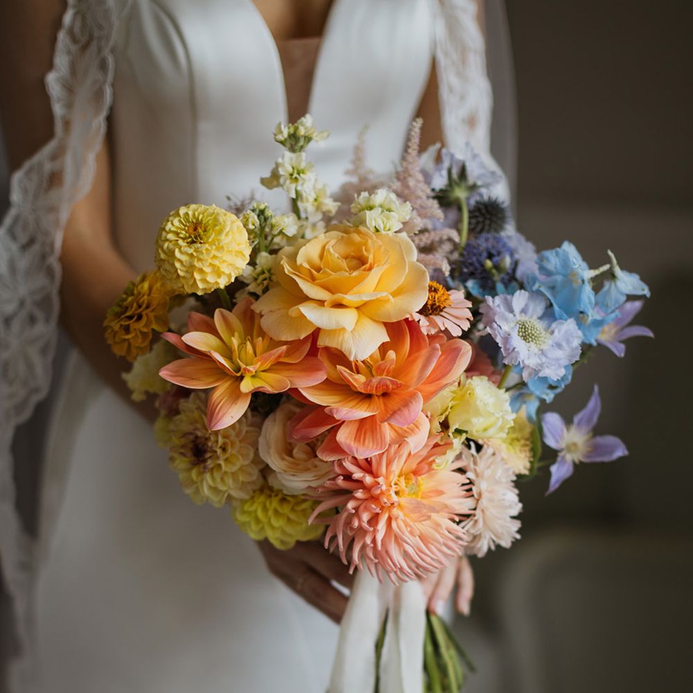 yellow-peach-and-blue-wedding-bouquet