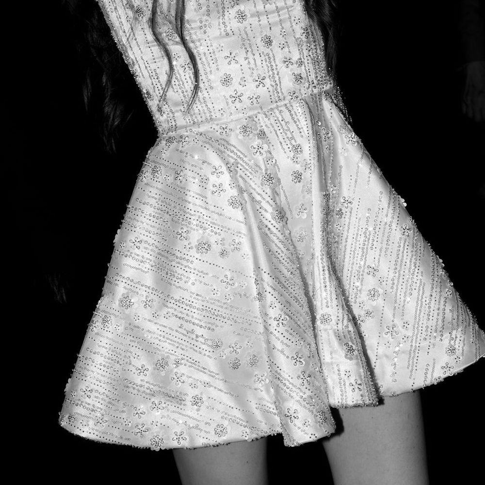 bride-in-short-sparkly-reception-dress