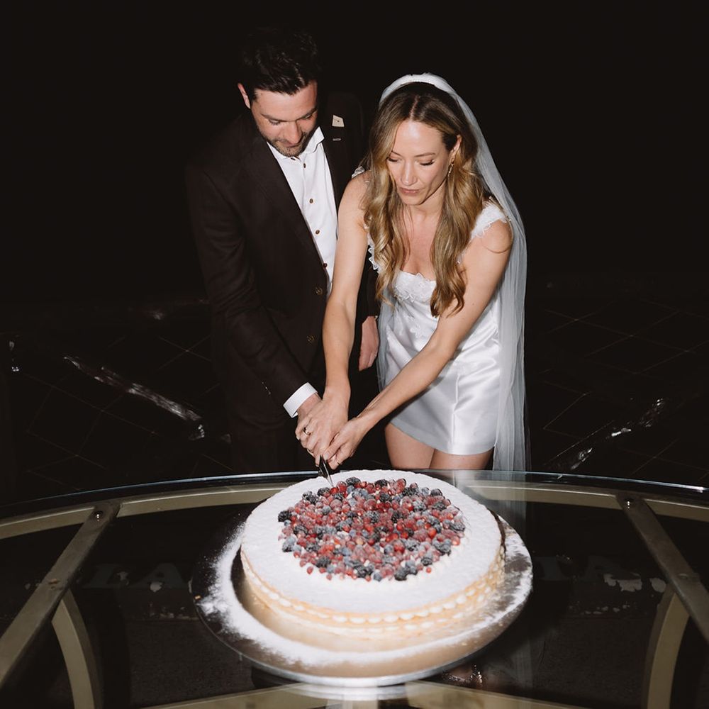 bride-and-groom-cut-mille-foglie-wedding-cake