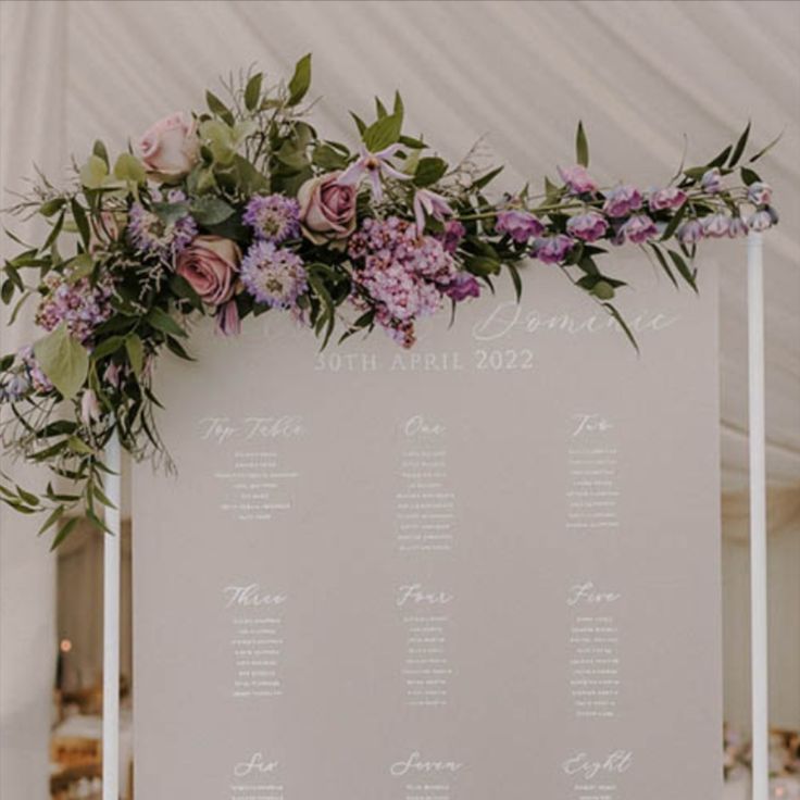 Frosted Acrylic Wedding Table Plan with Purple Wedding Flowers
