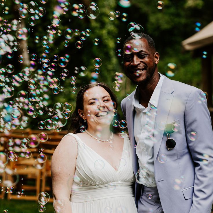 Groom Wears Lilac Wedding Suit with Bride in Empire Waist Wedding Dress