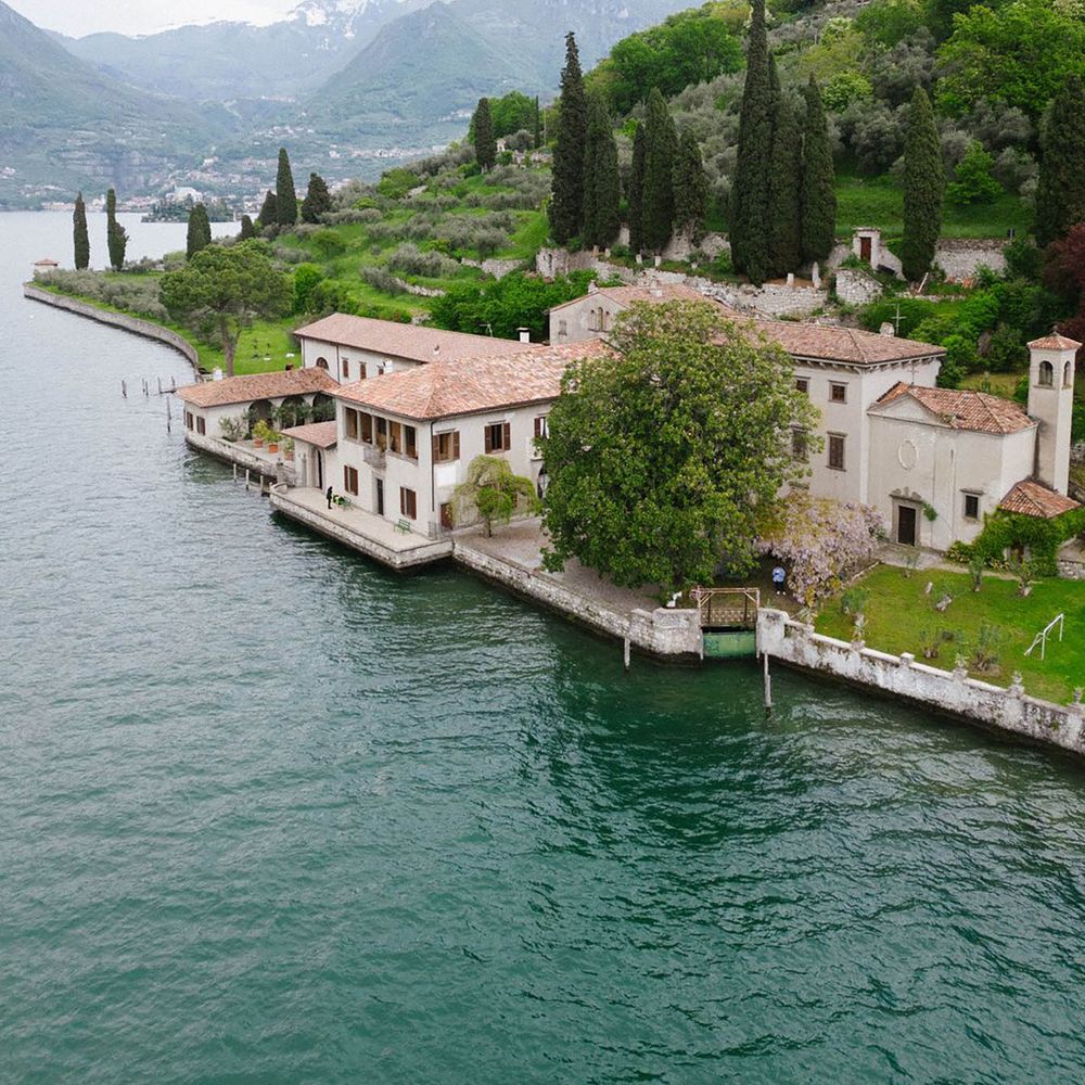 All inclusive honeymoon destination with grand building in iseo lake, italy