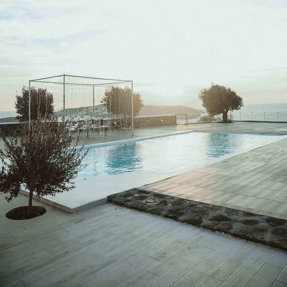 All inclusive honeymoon destination with pool area in santorini, greece