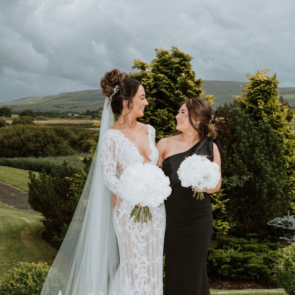 bridemsaid-in-one-shoulder-black-bow-dress-with-bride