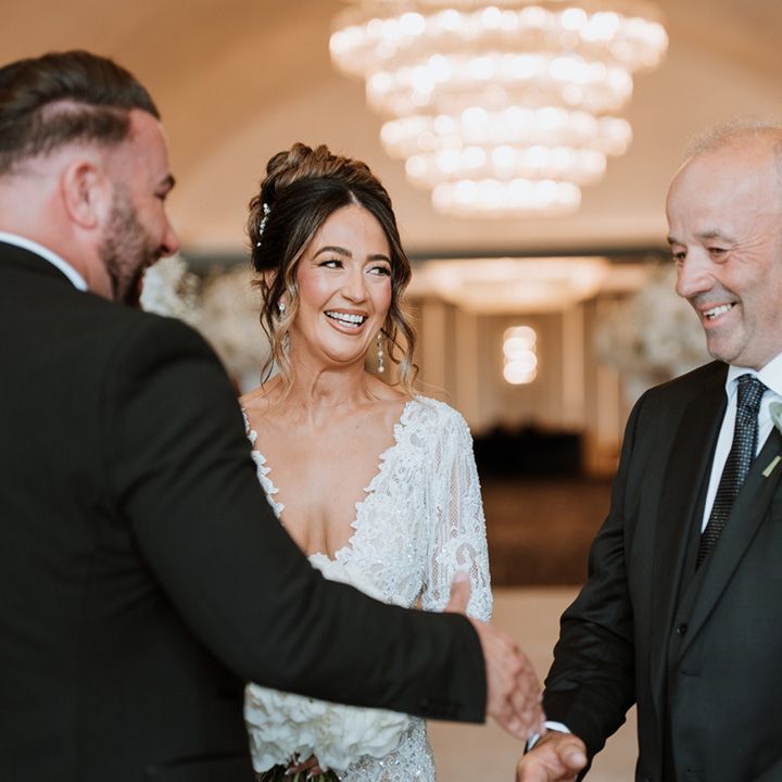 father-of-the-bride-shakes-hand-with-groom