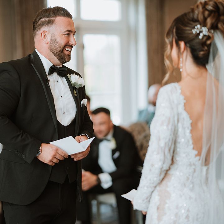groom-reads-out-his-wedding-vows