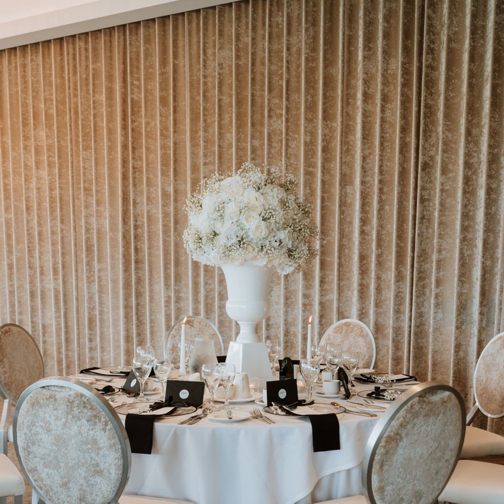 tall-white-wedding-flower-table-centrepiece