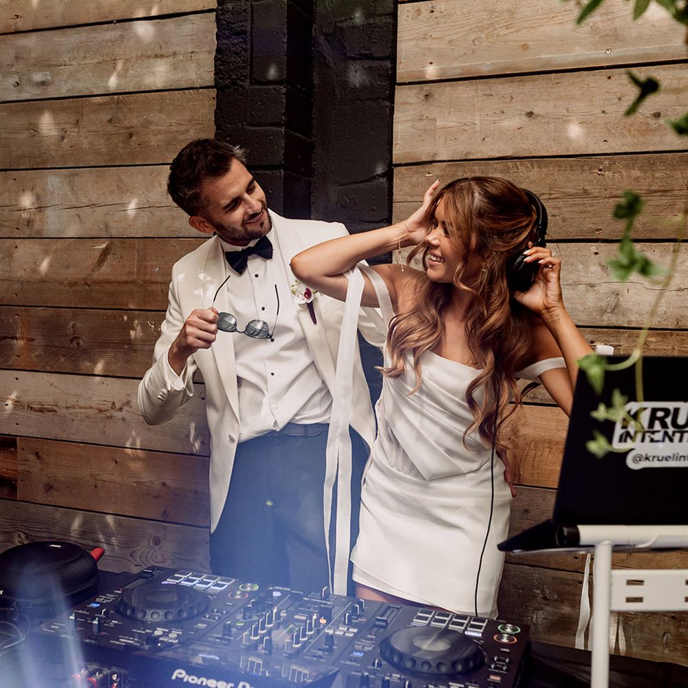 bride-and-groom-behind-the-decks-djing