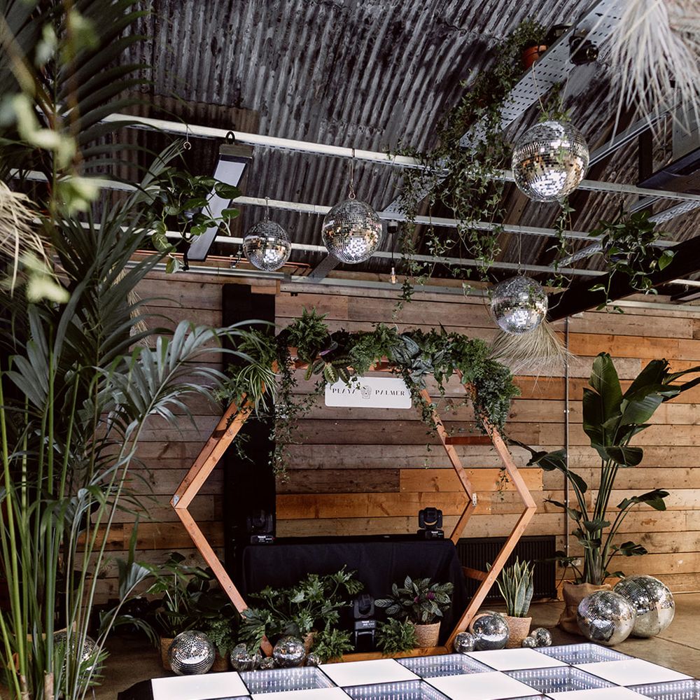 dance-floor-decor-with-disco-balls-and-plants