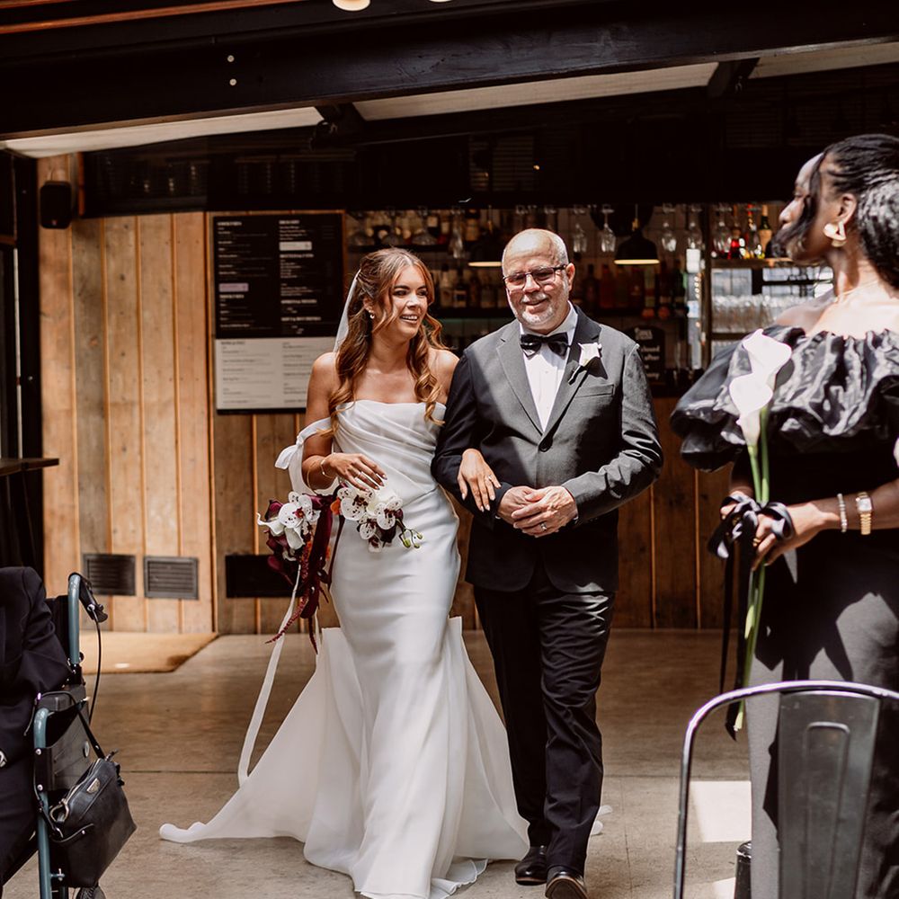 father-of-the-bride-walks-bride-down-the-aisle