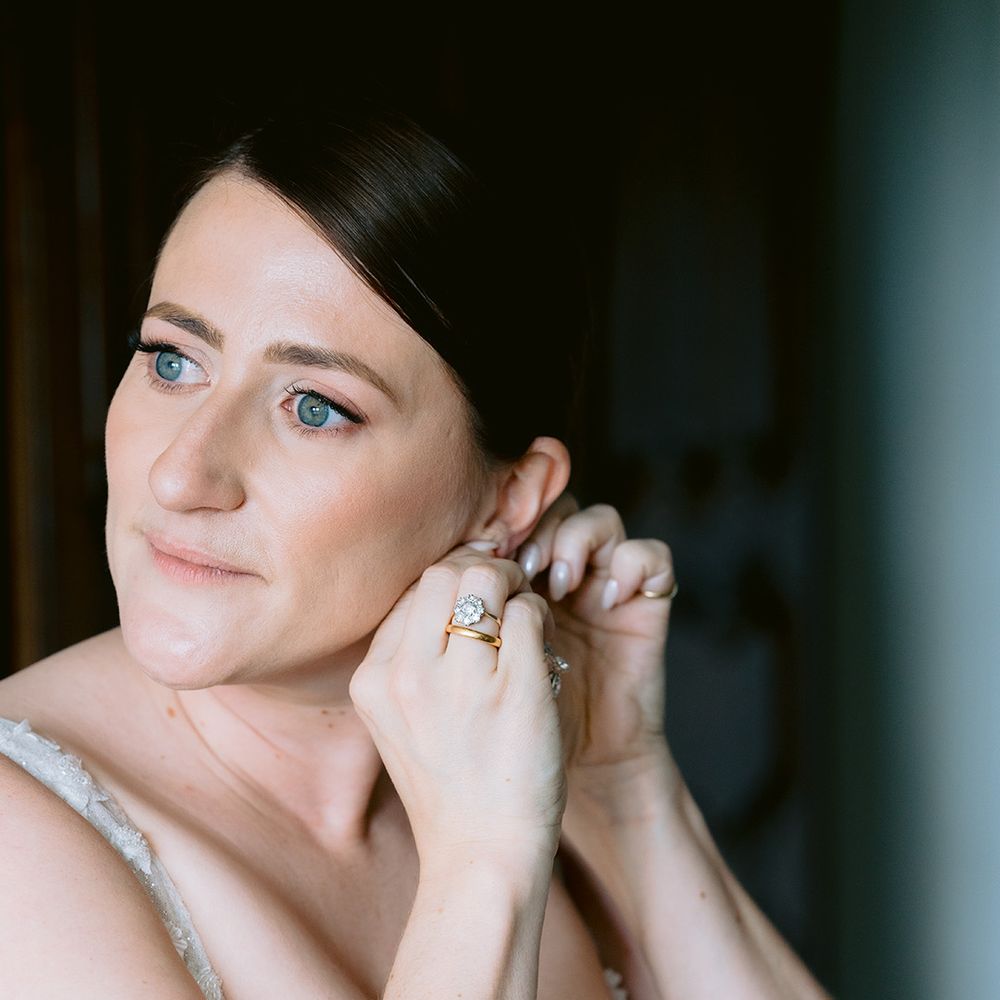 bride-puts-in-wedding-earrings